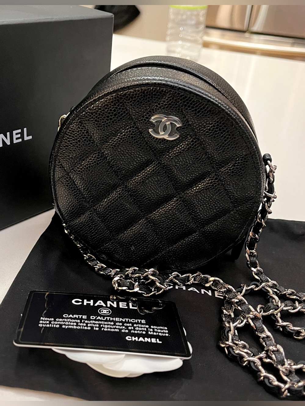 Unused w packaging CHANEL 5” Round Clutch with Chain, Black Caviar leather Silve